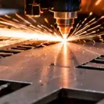 Assess Lean Manufacturing Readiness Before You Launch Editorial image showing laser cutting sheet metal on an automated CNC machine.